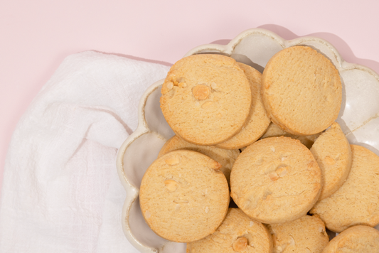 Cookies on a decorative plate with a soft pink background