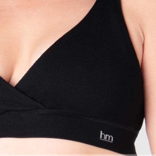 Black bra with 'hm' brand logo on a neutral background