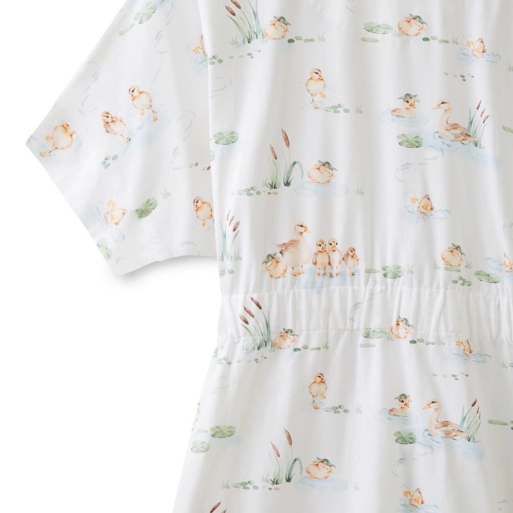 Robe with duckling pattern on a white background