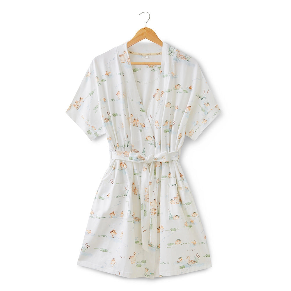 Robe with duckling pattern on a white background