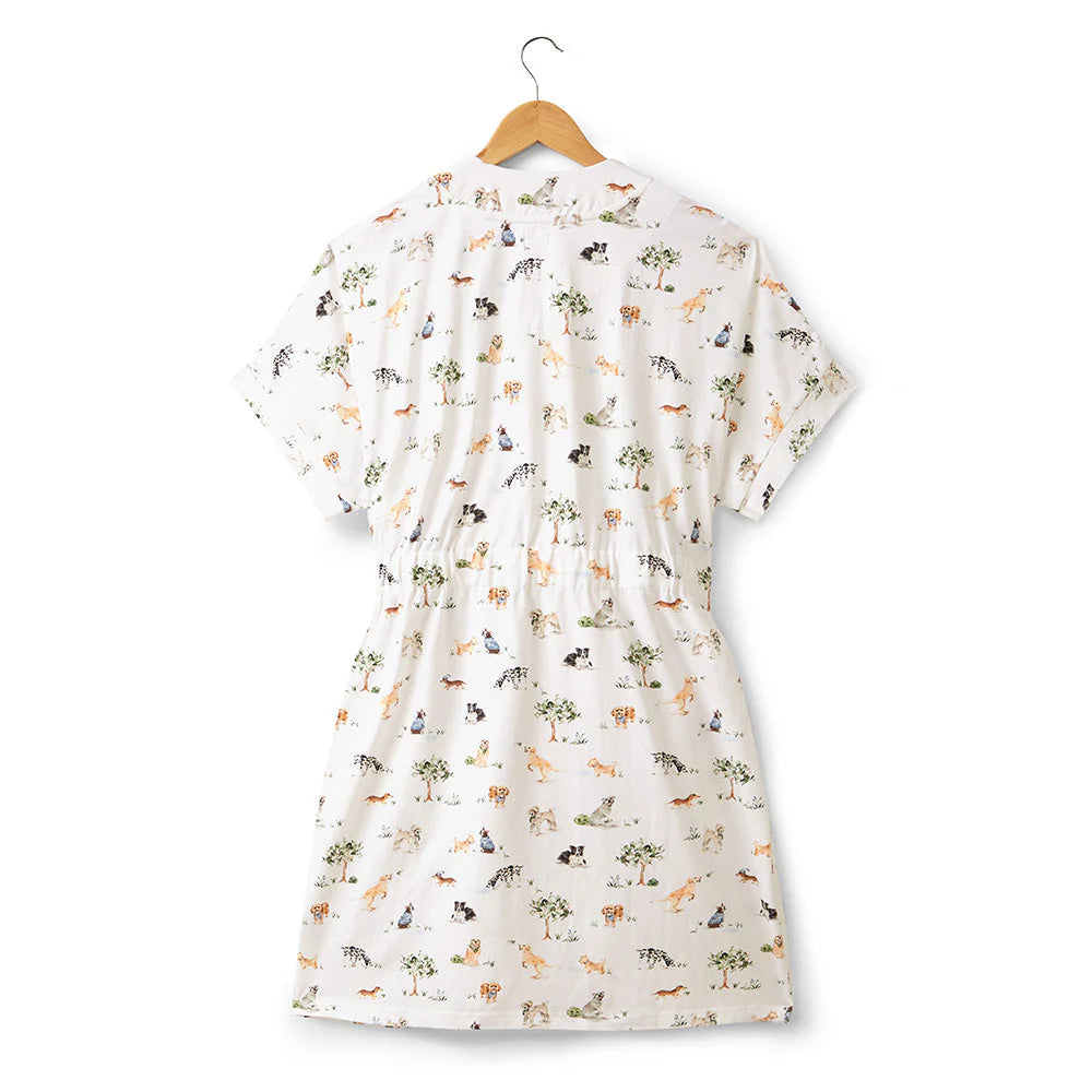 White dress with animal pattern on a hanger against a white background