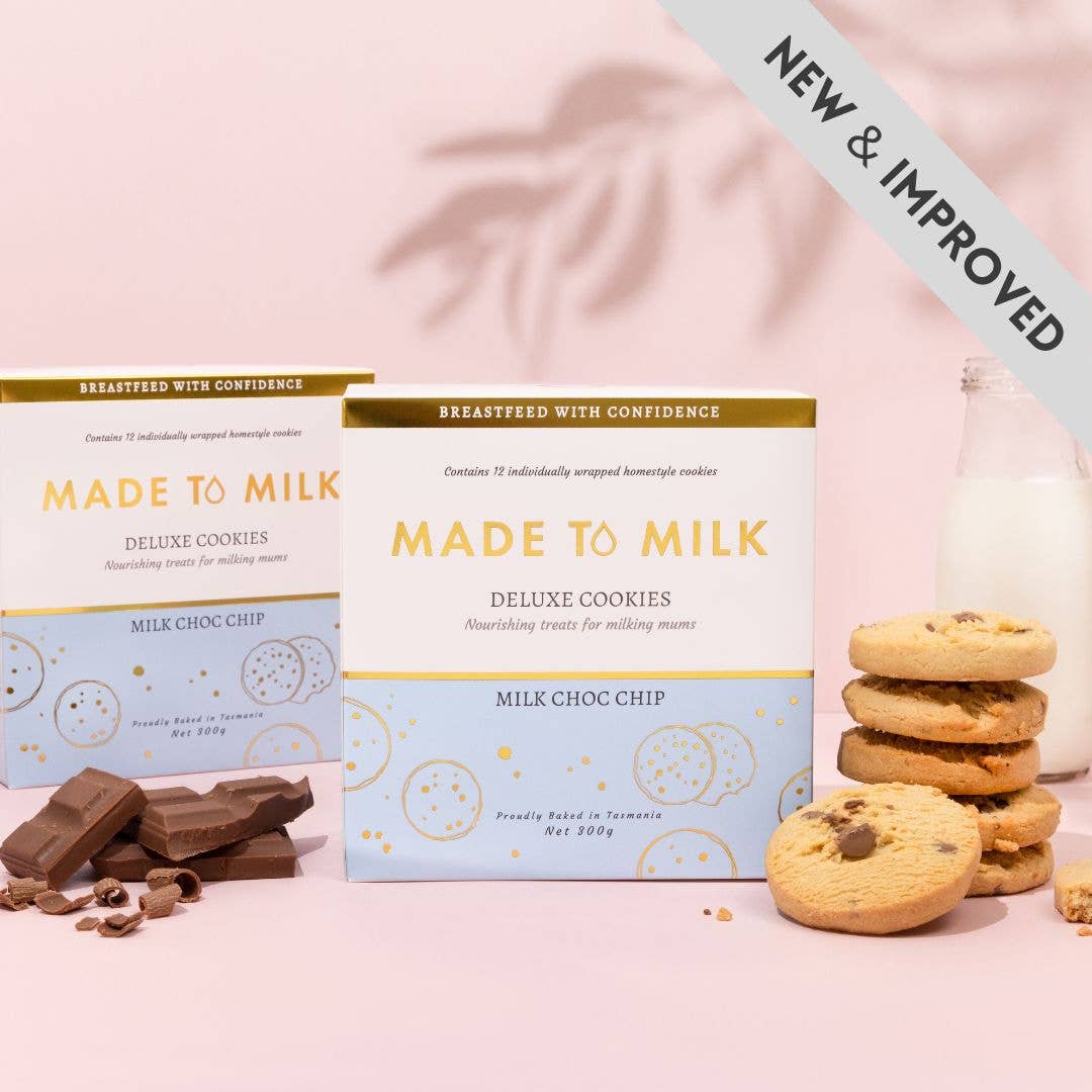 Made to Milk deluxe cookies packaging with lactation cookies and chocolate bars on a pink background